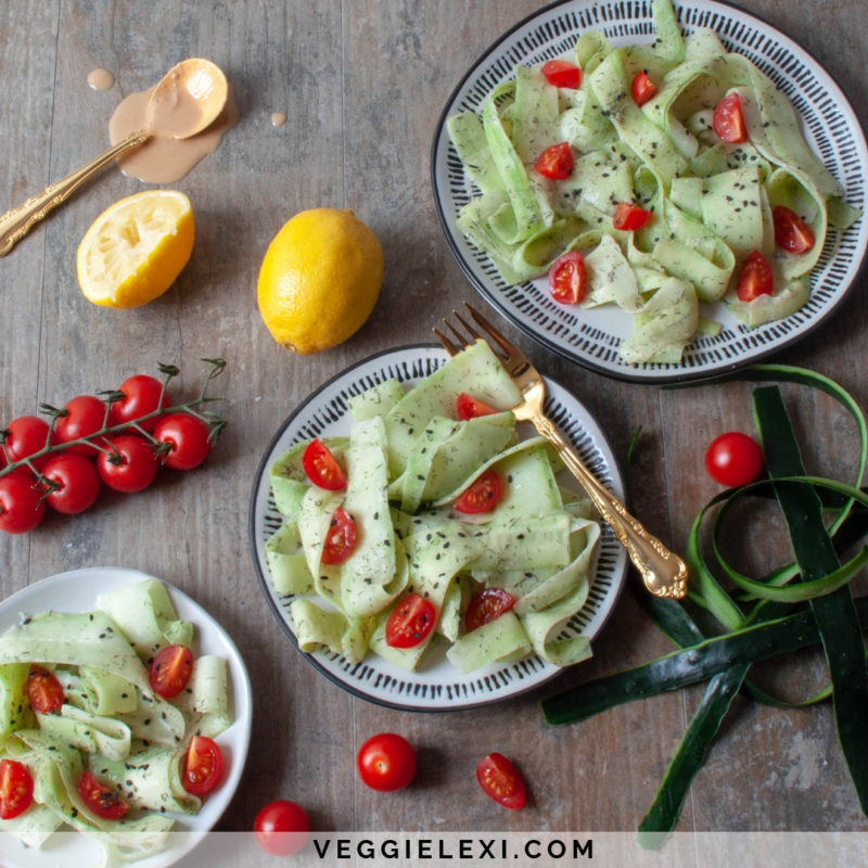 Peeled Cucumber Salad with Tahini, Lemon Juice, Cherry Tomatoes, and Black Sesame Seeds - by Veggie Lexi