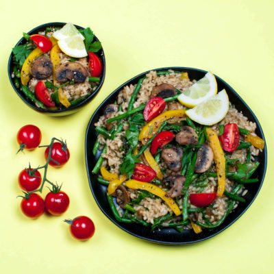 Vegan Risotto with Asparagus, Yellow Bell Pepper, Tomatoes, Parsley, and Lemon