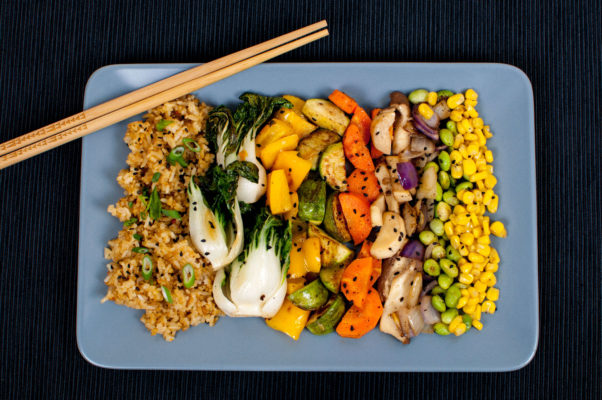 Vegan Fried Rice with Scallions, Sesame Seeds, Baby Bok Choy, Yellow Bell Pepper, Mayan Squash, King Oyster Mushrooms, Carrots, Edamame, Red Onion, and Corn