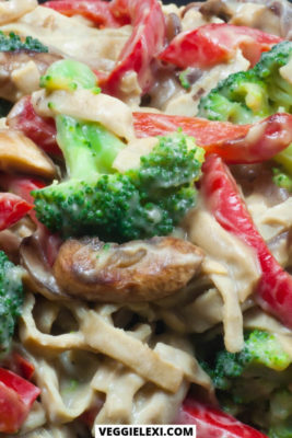 Fettuccine with healthy vegan Alfredo (oil free, nut free, and gluten free Alredo). Served with broccoli and red bell pepper.