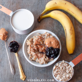 The Ultimate Creamy Oatmeal. Made with Soy Milk, Old Fashioned Oats, and Bananas. Topped with Peanut Butter and Jam. - by Veggie Lexi