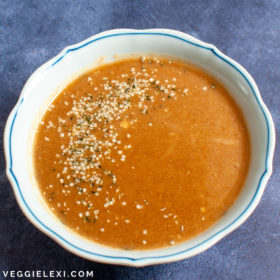 Delicious pumpkin soup that's savory, full of Fall spices, and just a hint of sweet. It comes together in only 5 minutes, one pot, and without blending. - by Veggie Lexi