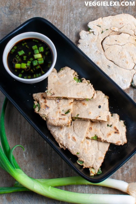 Healthy and delicious scallion pancakes that are made with oat flour. Vegan, gluten free, and oil free! #veggielexi #veganrecipes #glutenfreerecipes - by Veggie Lexi