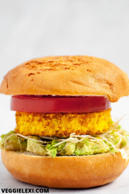 Delicious easy vegan and gluten free breakfast sandwich with a tofu "egg", avocado, tomato, and sprouts. #vegan #veganrecipes #veganbreakfast #veggielexi - by Veggie Lexi