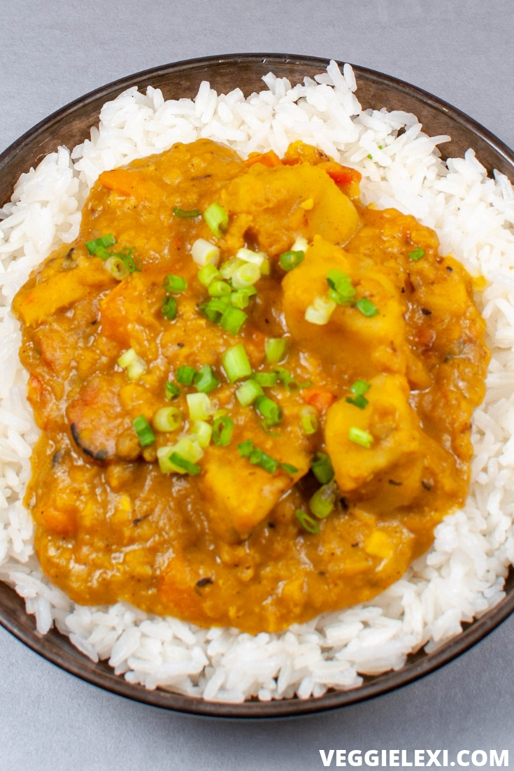 Try this delicious, easy, hearty, one pot coconut curry red lentil stew. It's loaded with sweet potatoes, onion, garlic, ginger, and carrots. Perfect on its own and pairs so well with rice, too. #veggielexi #veganrecipes #vegansoup #glutenfreerecipes - by Veggie Lexi