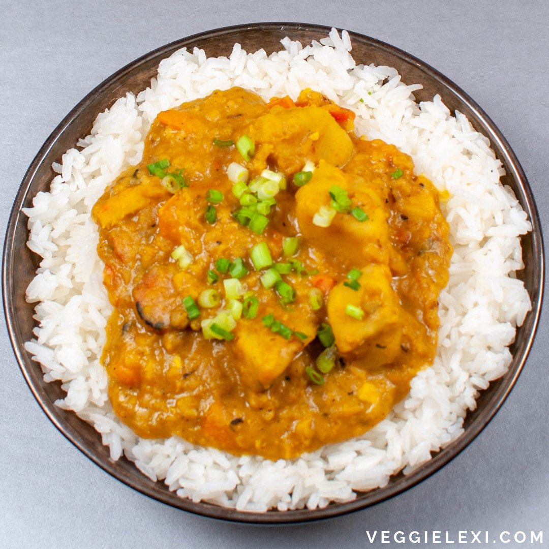 Try this delicious, easy, hearty, one pot coconut curry red lentil stew. It's loaded with sweet potatoes, onion, garlic, ginger, and carrots. Perfect on its own and pairs so well with rice, too. #veggielexi #veganrecipes #vegansoup #glutenfreerecipes - by Veggie Lexi