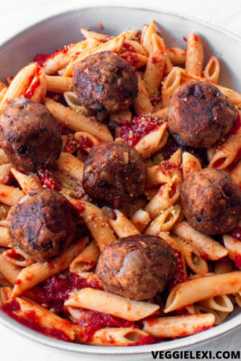 Delicious vegan and gluten free meatballs made with mushrooms and oat flour. Perfect for pasta or in a sub! #veggielexi #veganrecipes #glutenfreerecipes #veganmeatballs - by Veggie Lexi